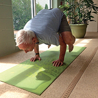 A resident nicknamed Uncas doing a handstand