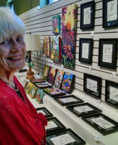 Resident Jo McMurtry in front of artwork at Natural Bridge.