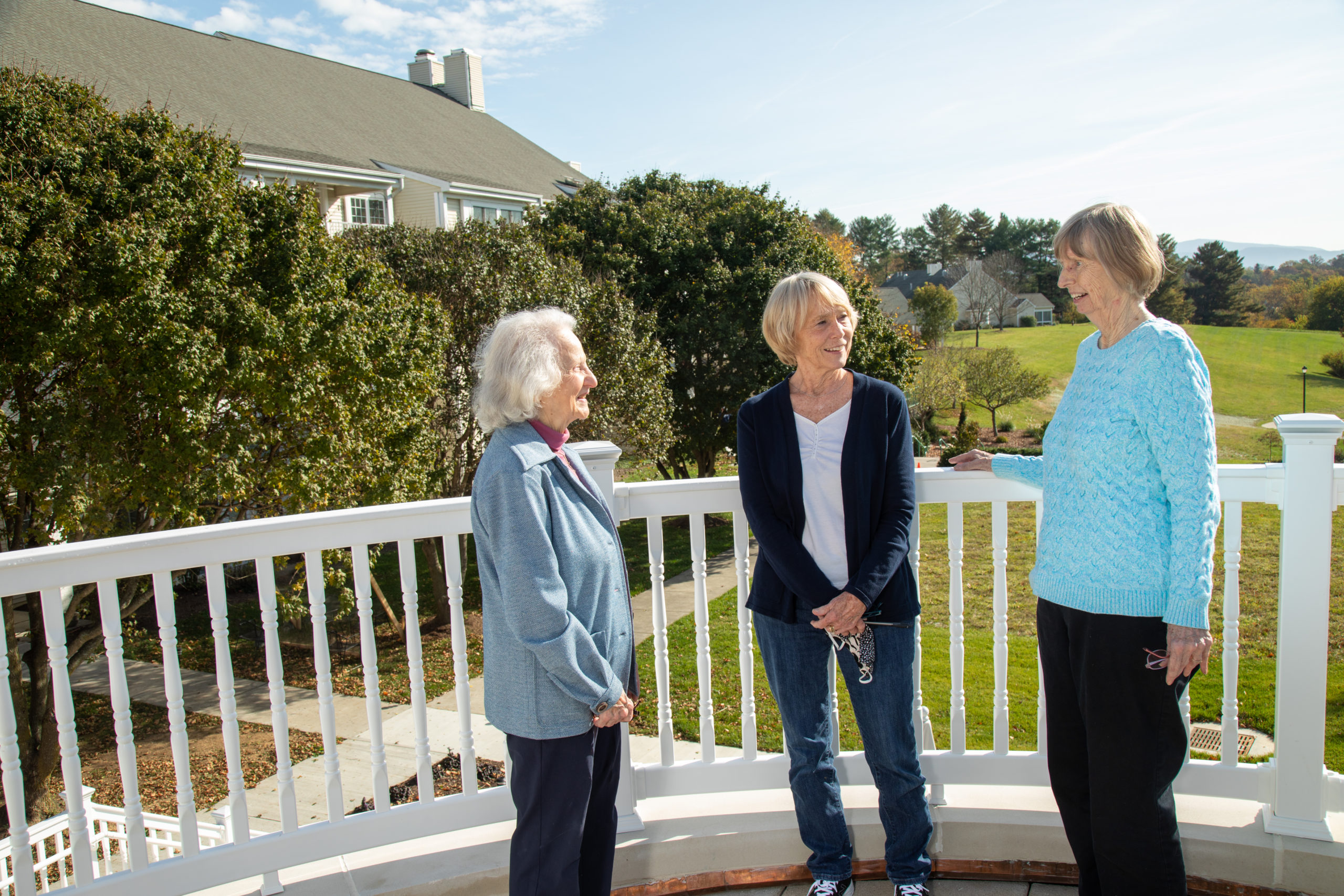 three woman on verandah