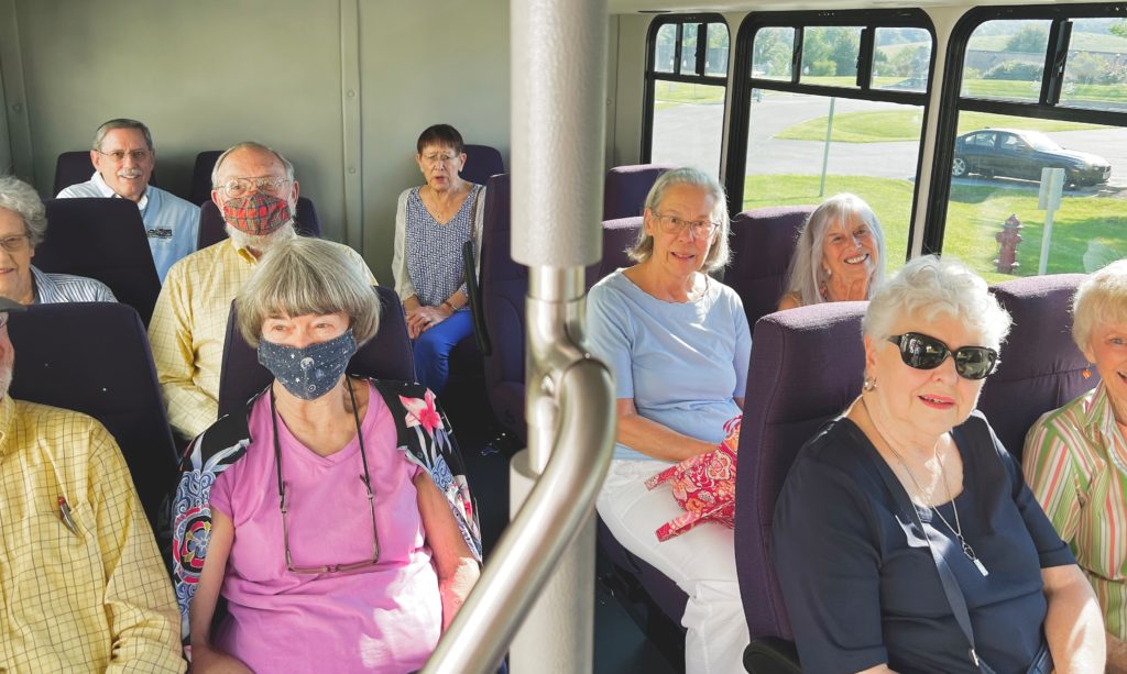 residents sitting on bus