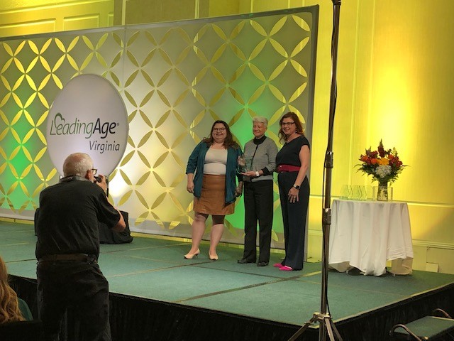 Jan Bigelow, CEO at Kendal at Lexington, accepts LeadingAge Virginia Workplace Excellence Award. 