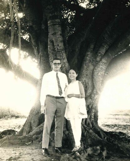 Sangmie and Bill old black and white photo under a tree. 