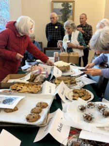 Residents enjoy a feast of desserts at the kendal bakeoff.